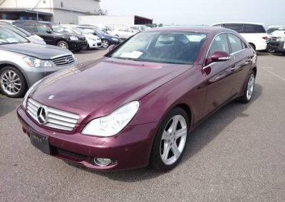 Mercedes Benz maroon car