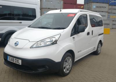 Nissan Quest white minivan photo